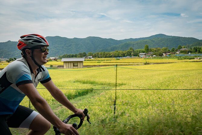 Arashiyama Bamboo Forest E-Biking Tour - Riding realities: 25km, hills, and sharing the road