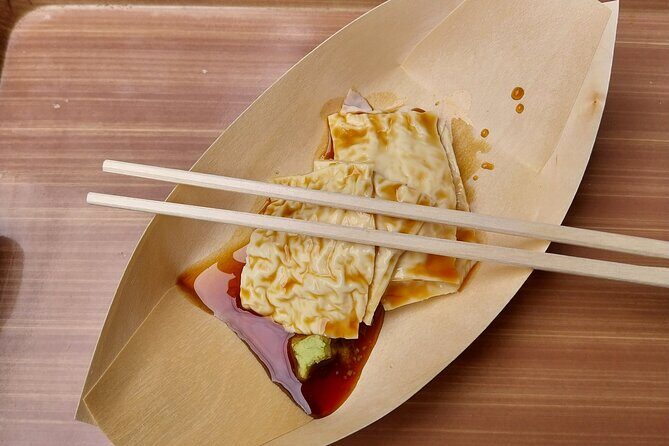 Kyoto Food Tour of 10 Tastings with Wagyu, Mochi & More Surprises - Stop 1: Starbucks Karasuma Oike meeting point and the orange-umbrella intro