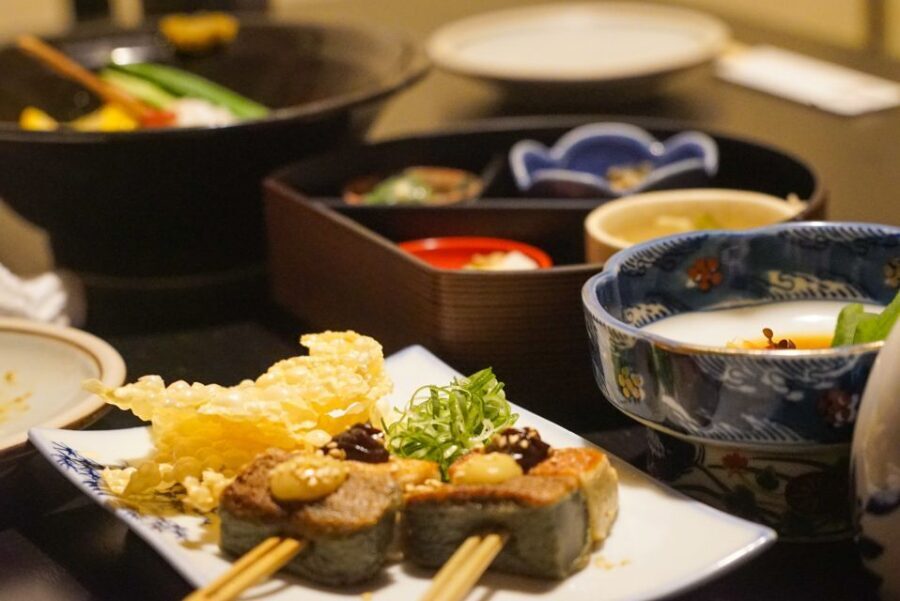 Kyoto: Foodie Night Tour in Gion with 9 dishes + 6 Sake - Walking through Ponto-cho: the route becomes part of the meal