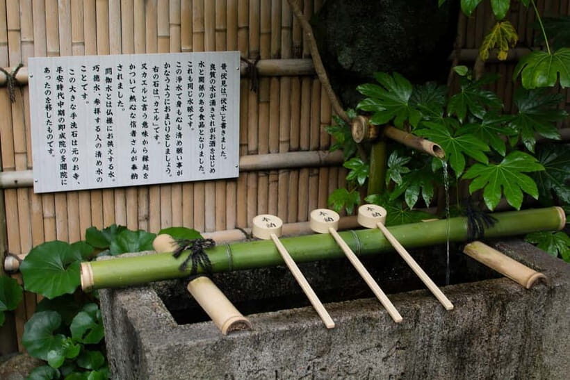 Kyoto: Fushimi Sake District Tour with Boat Ride - From JR Chushojima Station to Fushimi: start smart