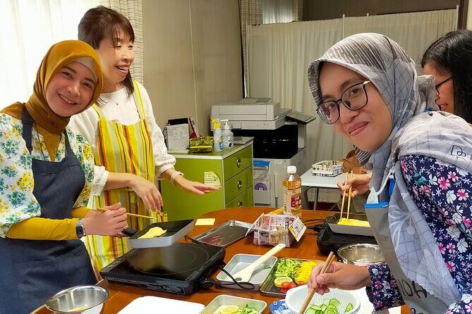 Near Fushimiinari: Kyoto Home Cooking Class & Supermarket tour - Traditional tatami dining and the mochi moment